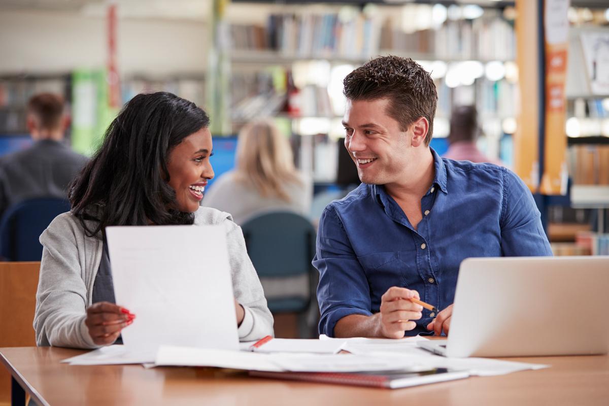 two students discussing work